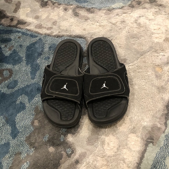 all black jordan sandals